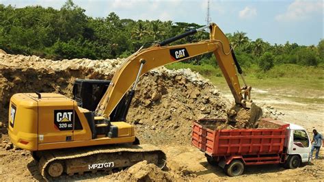 mini excavator loading dump truck|excavators loading dump trucks youtube.